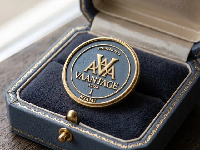 The numbered Vaantage founding pin in slate blue enamel and gold, in an open leather box